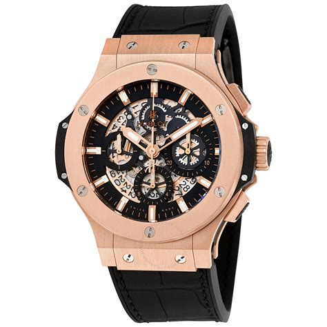 hublot black and gold watch.